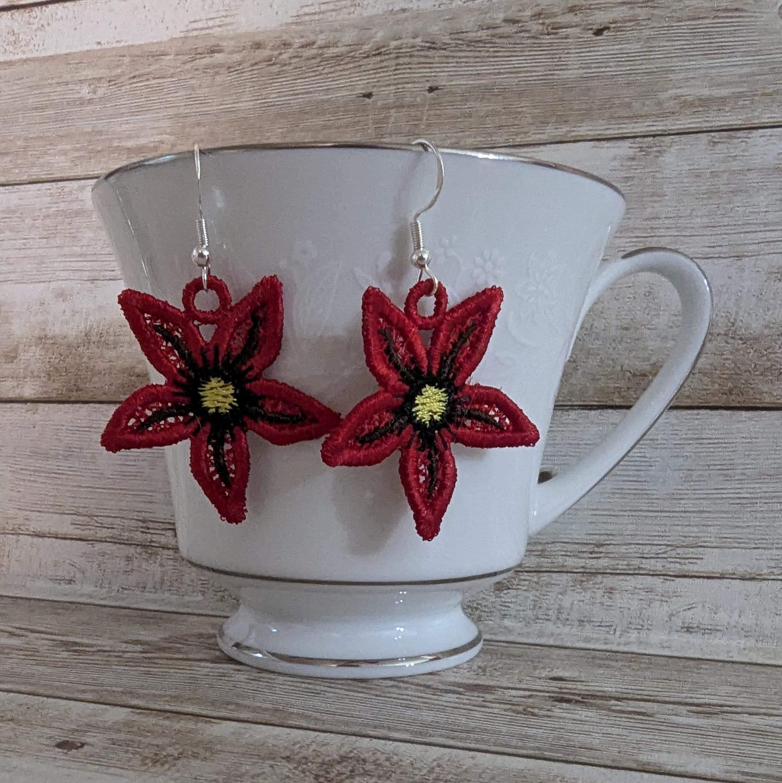 Beautiful poinsettia embroidered drop earrings