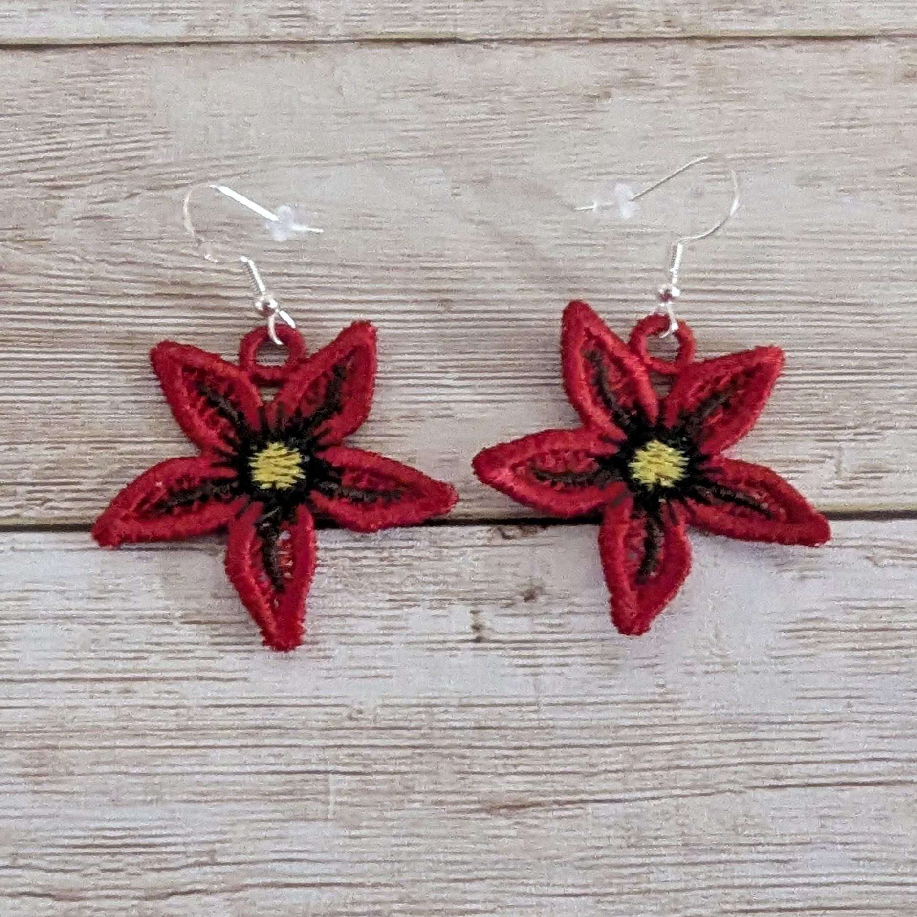 Beautiful poinsettia embroidered drop earrings